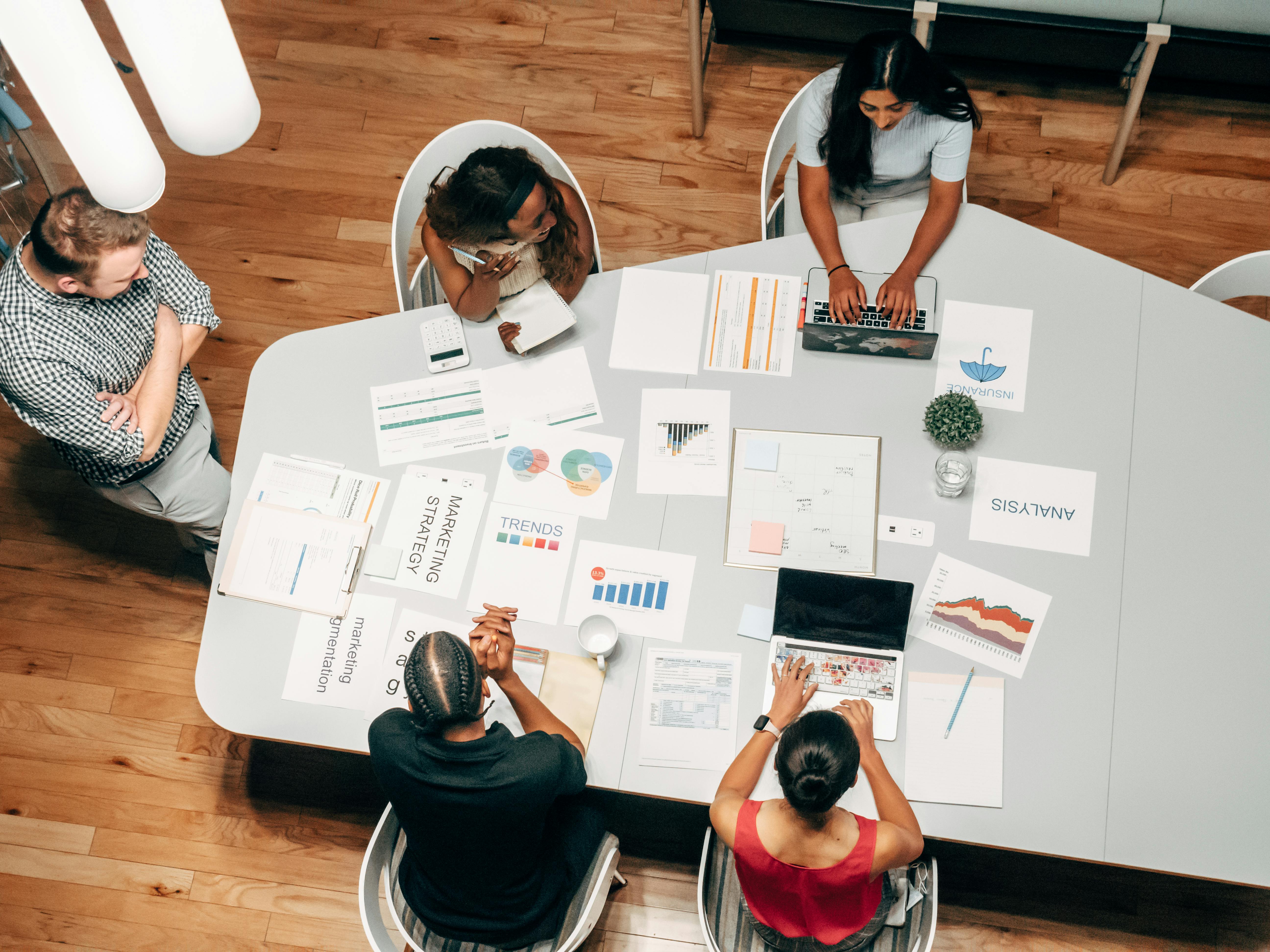 Marketing team analyzing a digital sales funnel dashboard